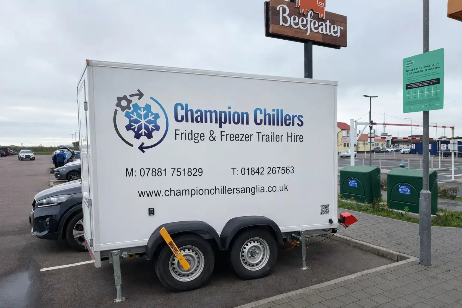 Champion Chillers fridge and freezer trailer hire unit parked outside a Beefeater restaurant.